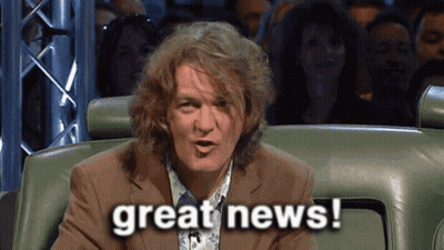 Man In Suit Says Great News To Crowd GIF