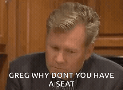 Man In Suit Says Greg Why Dont Have Seat GIF