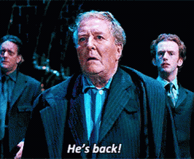 Man In Suit Says He's Back To Two Men GIF