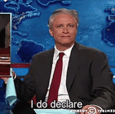 Man In Suit Says I Do Declare Before Map GIF