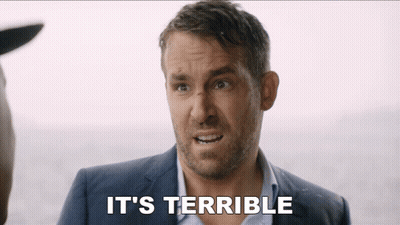 Man In Suit Says It's Terrible By Ocean GIF
