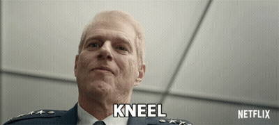 Man In Suit Says Kneel Netflix Advertisement GIF