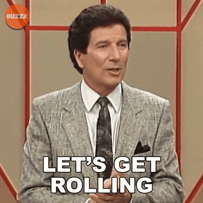 Man In Suit Says Let's Get Rolling GIF