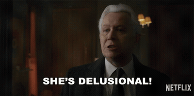 Man In Suit Says She's Delusional GIF