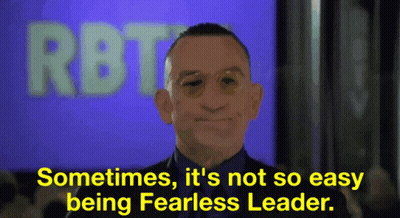 Man In Suit Says Sometimes It's Not So Easy Being Fearless Leader GIF