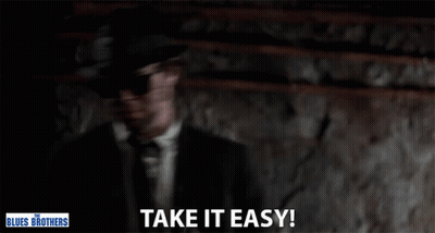 Man In Suit Says Take It Easy Blues Brothers Sign GIF