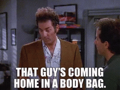 Man In Suit Says That Guy's Coming Home In A Body Bag GIF