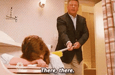 Man In Suit Says There There To Woman In Bathtub GIF