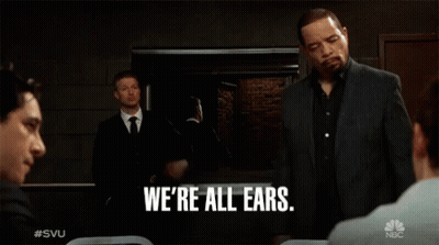 Man In Suit Says We're All Ears To Group GIF