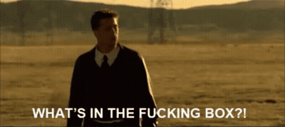 Man In Suit Says What's In The Fucking Box GIF