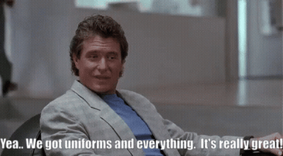 Man In Suit Says Yea We Got Uniforms GIF