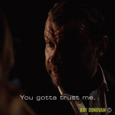Man In Suit Says You Gotta Trust Me In Dark Room GIF