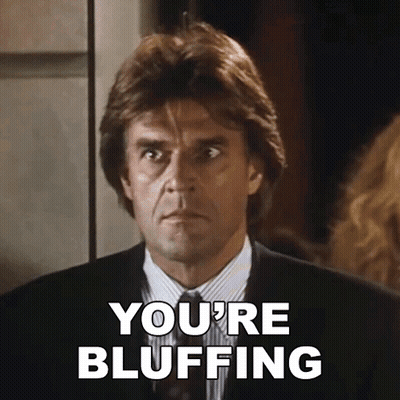 Man In Suit Says You're Bluffing GIF