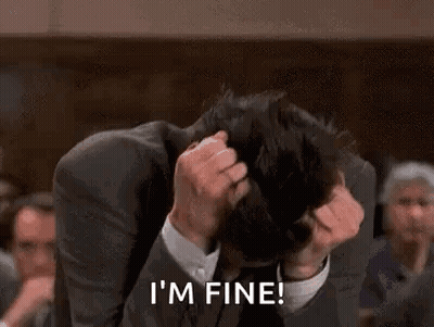 Man In Suit Scratching Head Saying I'm Fine GIF