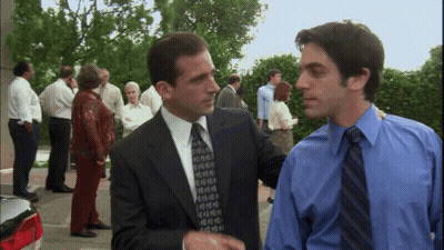 Man In Suit Shaking Hands With Another Man GIF