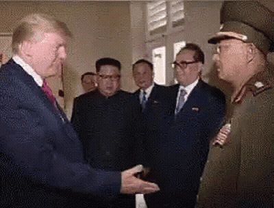 Man In Suit Shaking Hands With Military Officer GIF