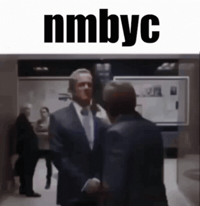 Man In Suit Shaking Hands With Nmbyc GIF