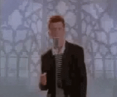 Man In Suit Singing Into Microphone GIF