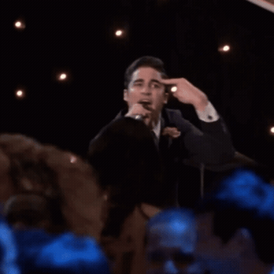 Man In Suit Singing Into Microphone GIF