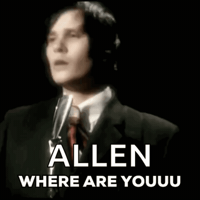 Man In Suit Singing Into Microphone GIF