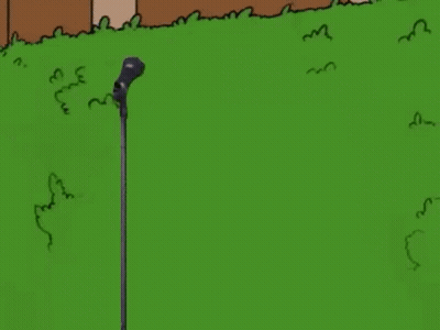 Man In Suit Singing Into Microphone GIF