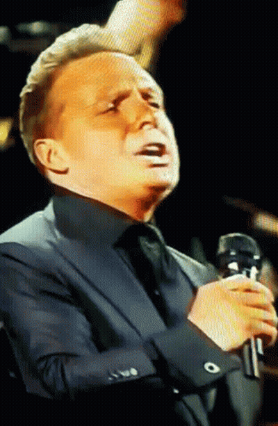 Man In Suit Singing Into Microphone Eyes Closed GIF