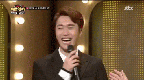 Man In Suit Singing Into Microphone GIF