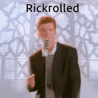 Man In Suit Singing Into Microphone Rickrolled GIF
