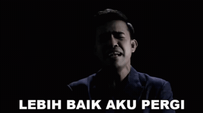 Man In Suit Singing Lebih Baik Aku Pergi GIF