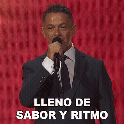 Man In Suit Singing Lleno De Sabor Y Ritmo GIF