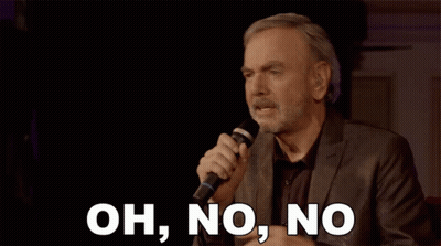 Man In Suit Singing Oh No No Into Microphone GIF