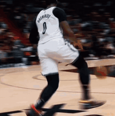 Man In Suit Singing To Seated Audience GIF