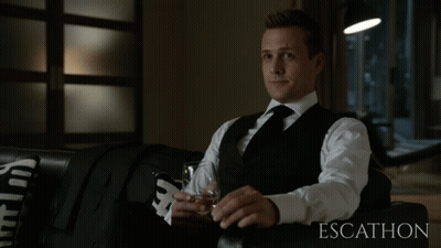 Man In Suit Sitting At Computer GIF