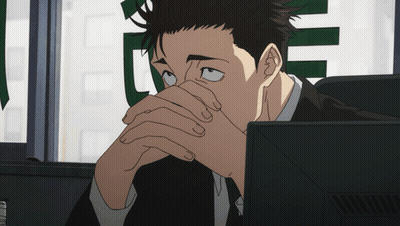 Man In Suit Sitting At Computer GIF