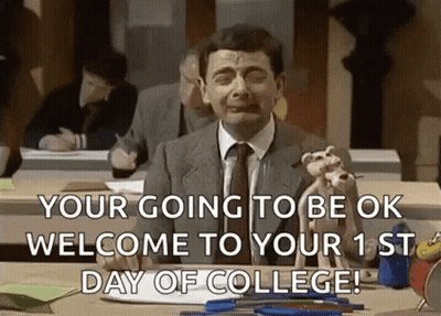 Man In Suit Sitting At Desk Holding Dog GIF