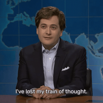 Man In Suit Sitting At Desk Says I've Lost My Train Of Thought GIF