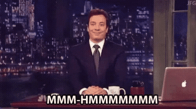 Man In Suit Sitting At Laptop Says Mmmm-Hmmmmmmmm GIF