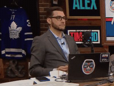 Man In Suit Sitting At Laptop With Alex Sticker GIF