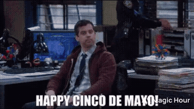 Man In Suit Sitting At Police Desk GIF