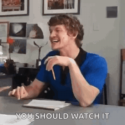 Man In Suit Sitting At Table #Latenightseth GIF