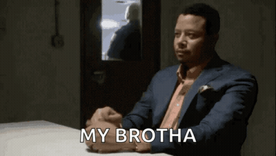 Man In Suit Sitting At Table With My Brotha GIF