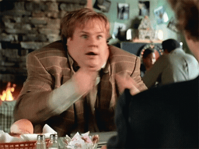 Man In Suit Sitting At Table With Others GIF