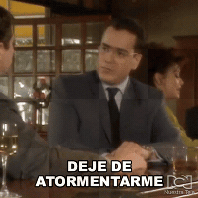 Man In Suit Sitting At Table With Wine And Woman GIF