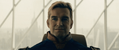 Man In Suit Sitting By Large Window GIF