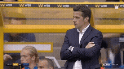 Man In Suit Sitting Crossed Arms GIF