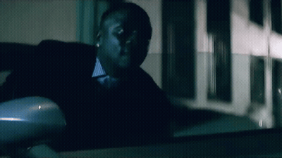 Man In Suit Sitting In Car At Night GIF