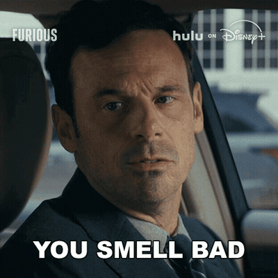 Man In Suit Sitting In Car Says You Smell Bad GIF