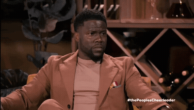 Man In Suit Sitting In Chair GIF