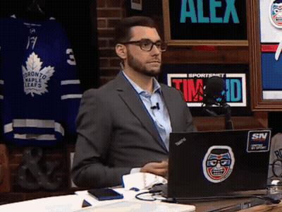 Man In Suit Sitting In Front Of Laptop Saying Alex GIF