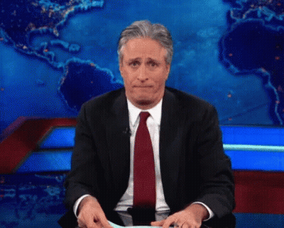 Man In Suit Sitting In Front Of Map GIF